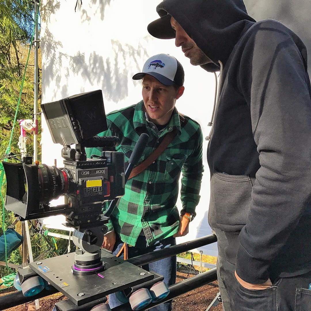 Director Devin Leisher (green shirt) with the Epic-W on the dolly during a Portland setup