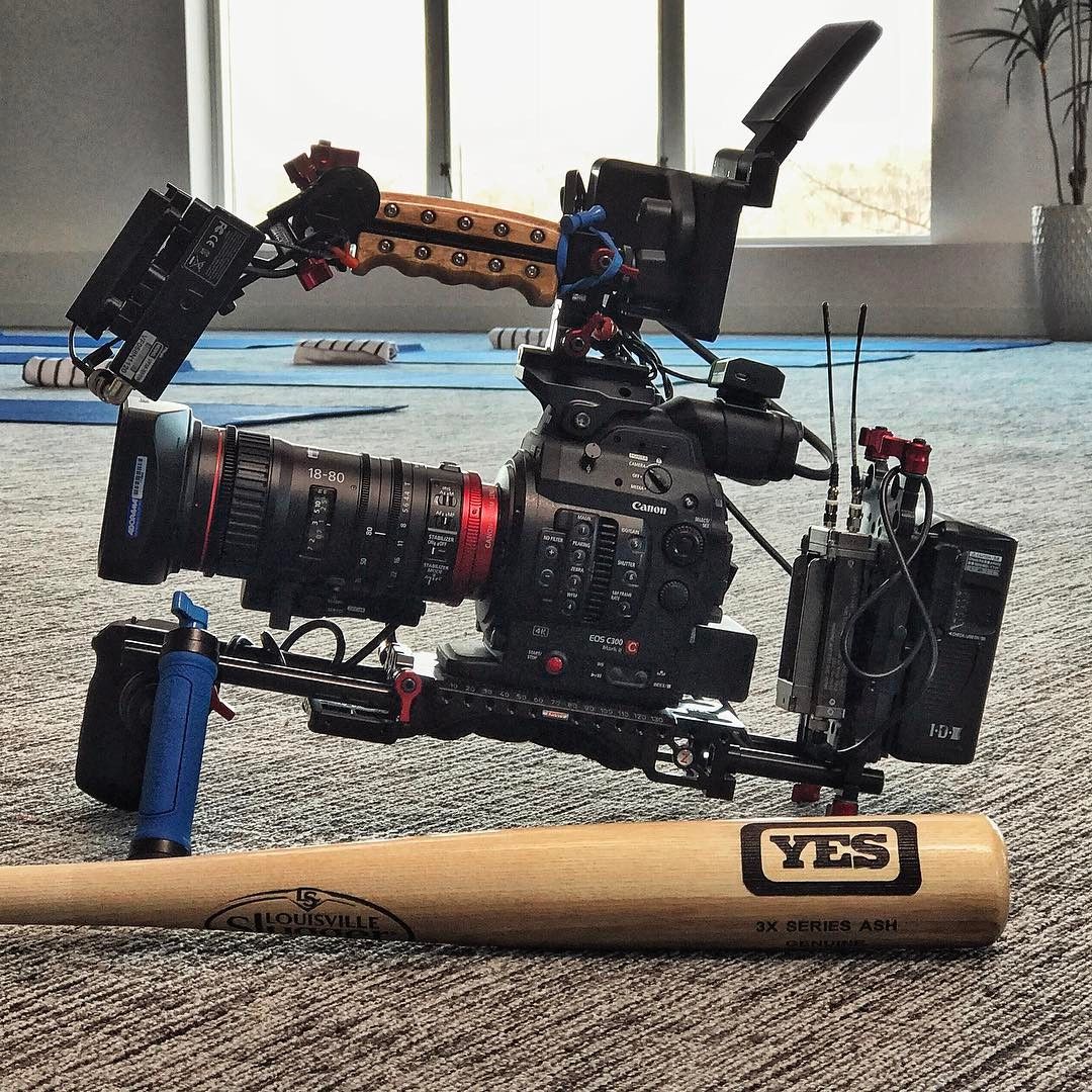 C300 with the Canon 18-80 next to a YES Network Louisville Slugger